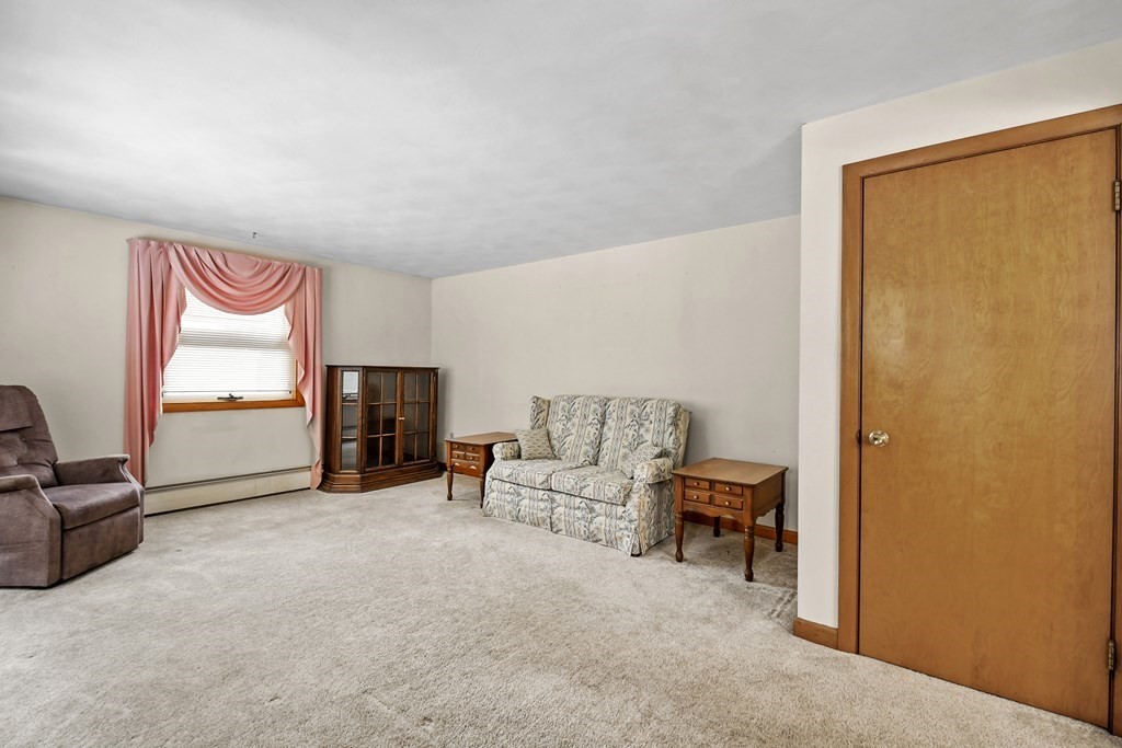 179 State Road Templeton, MA 01436 - Photo 12 of 22 a living room with furniture and a flat screen tv