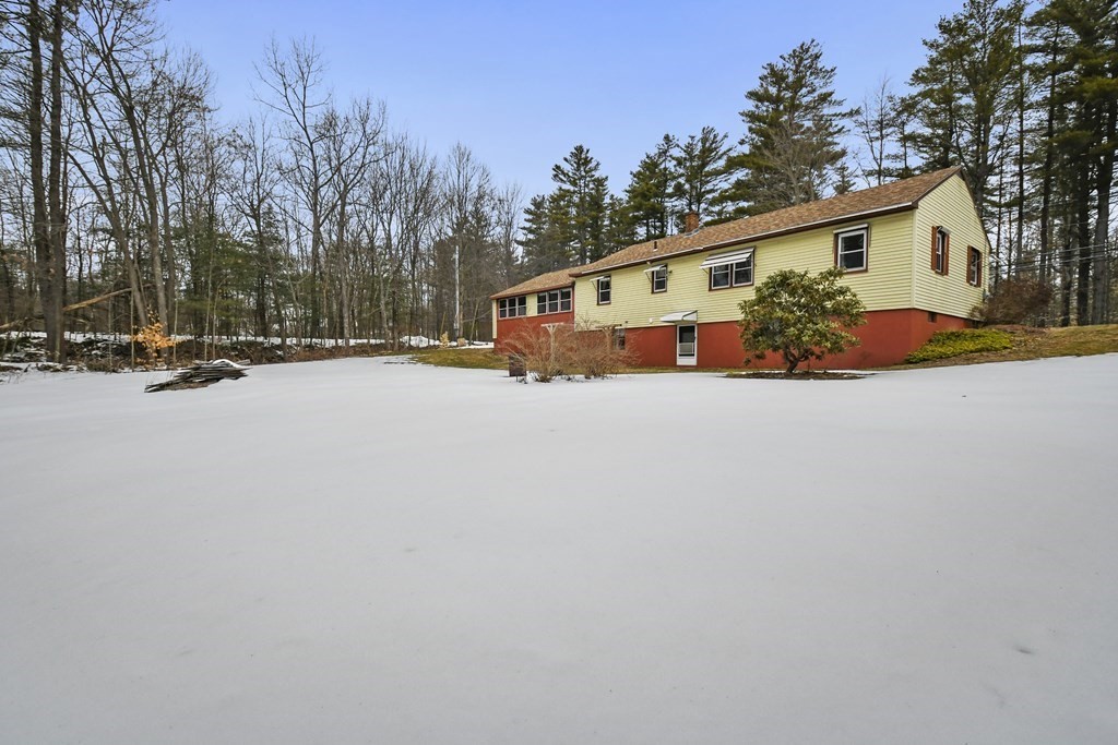 179 State Road Templeton, MA 01436 - Photo 4 of 22 a front view of a house with a yard and garage