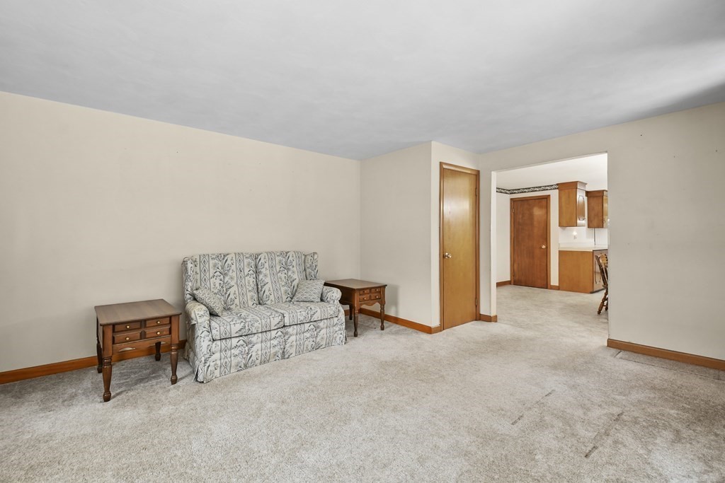 179 State Road Templeton, MA 01436 - Photo 10 of 22 a living room with furniture and a table