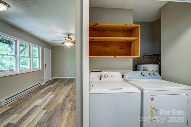 a utility room with dryer and washer