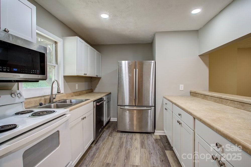 573 Margot Road Boone, NC 28607 - Photo 10 of 15 a kitchen with a sink appliances and cabinets