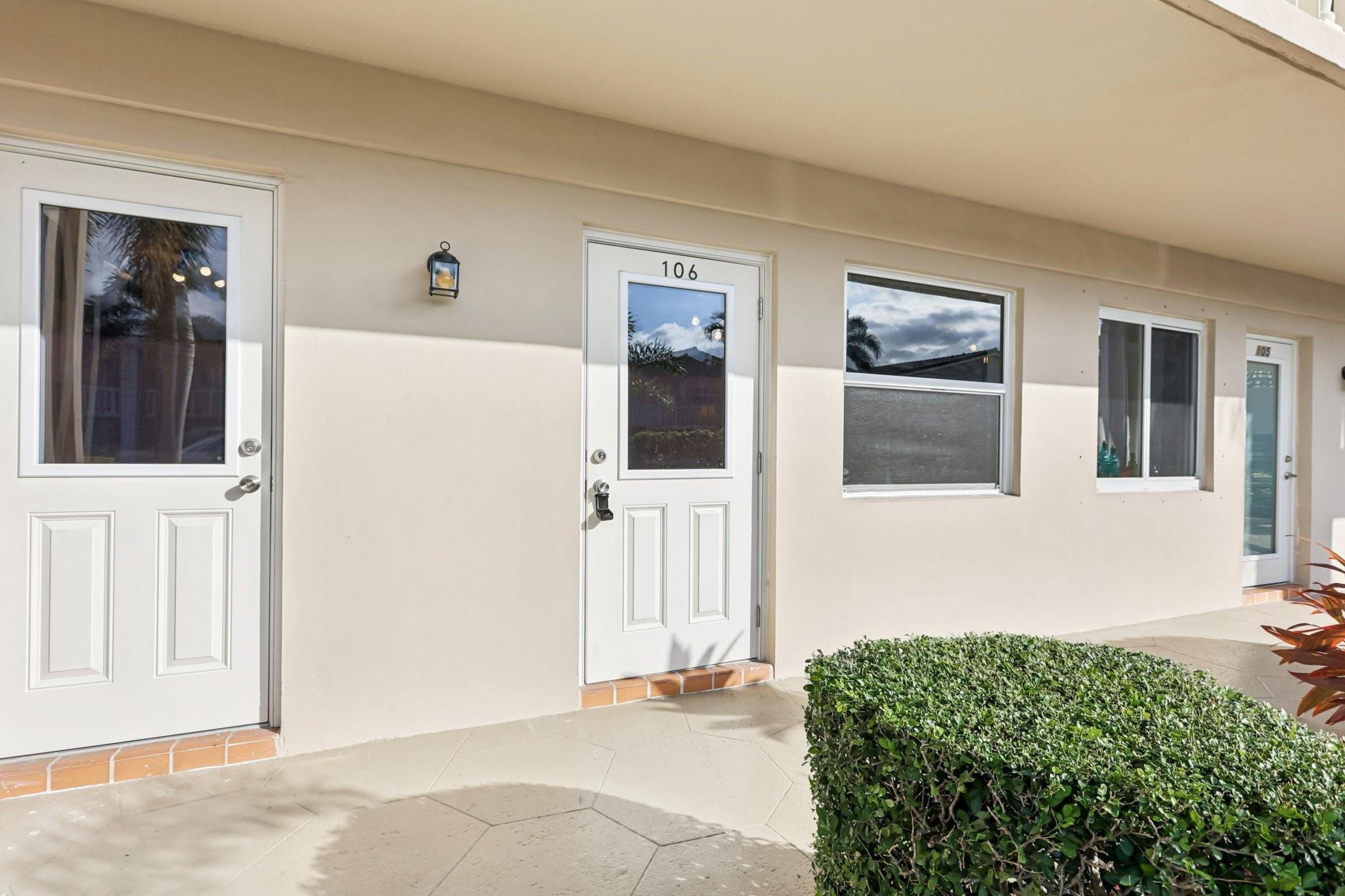 2131 Northeast 42nd Court, Unit 106E Lighthouse Point, FL 33064 - Photo 33 of 33 a view of front door of house