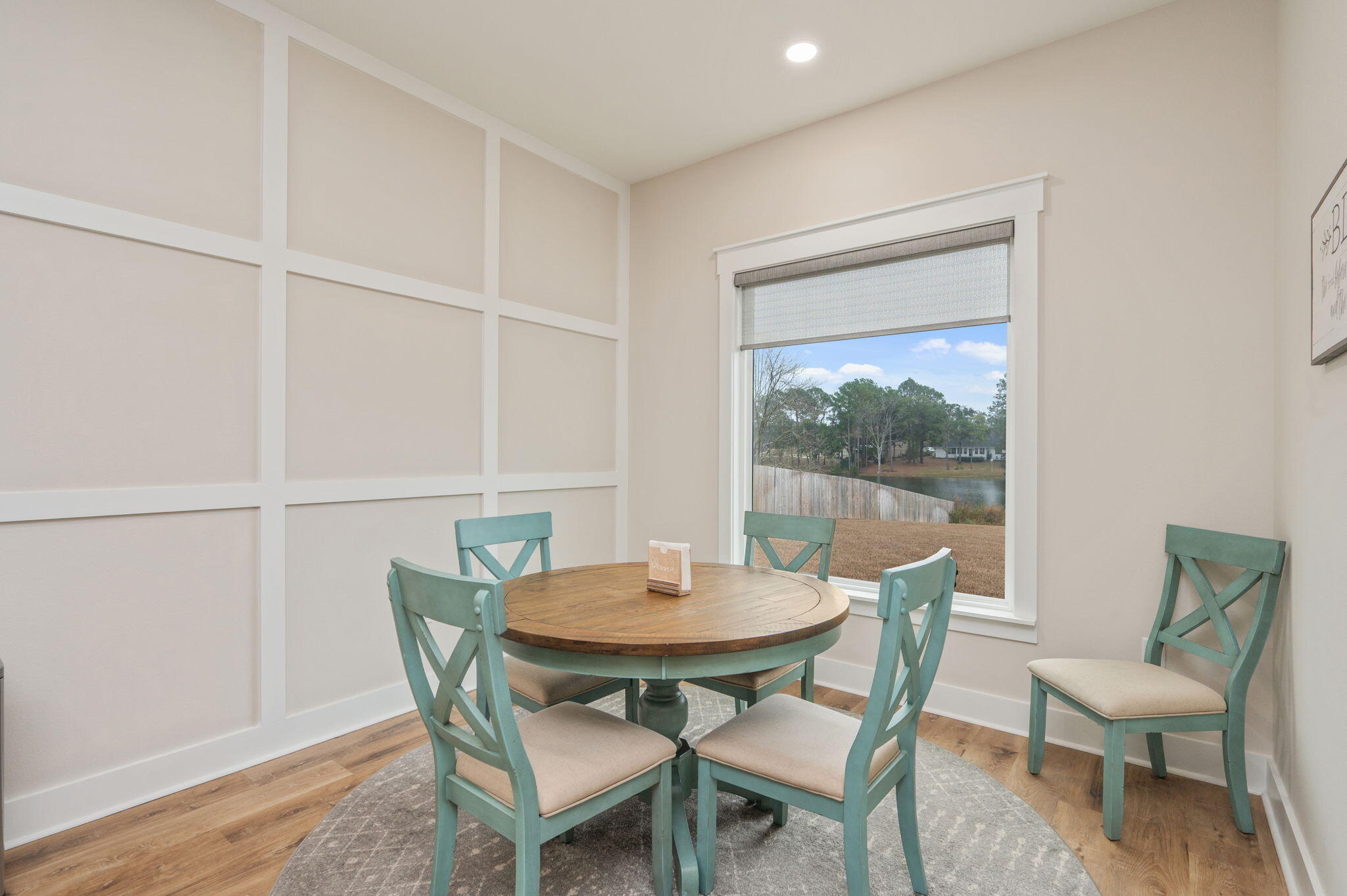 280 Timberline Drive Crestview, FL 32539 - Photo 12 of 46 a view of a dining room with furniture window and wooden floor