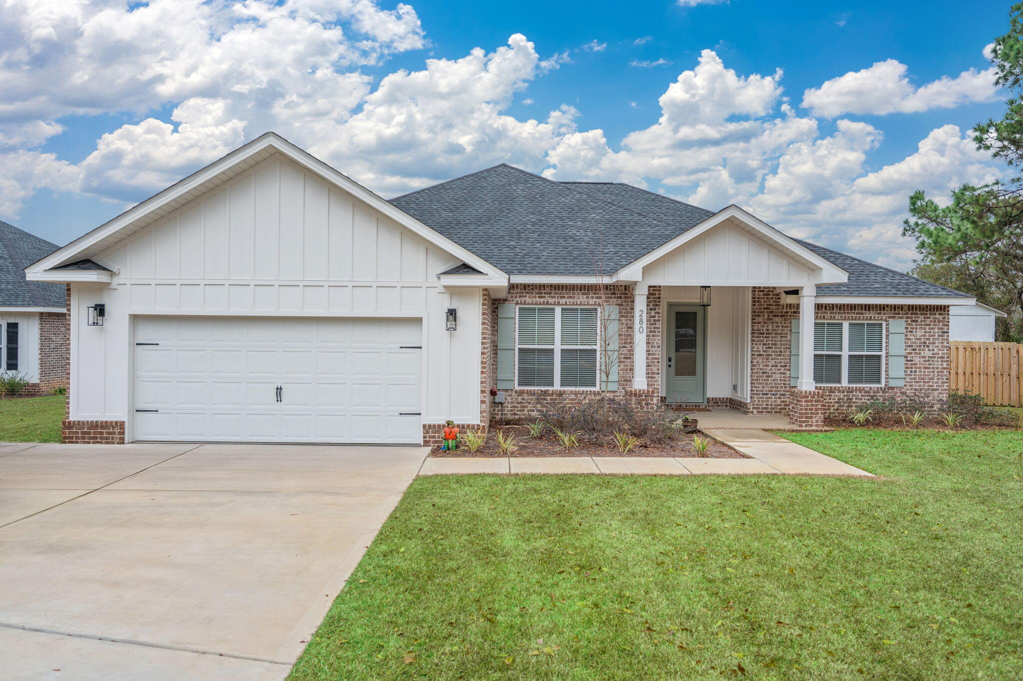280 Timberline Drive Crestview, FL 32539 - Photo 2 of 46 a front view of house with yard and green space