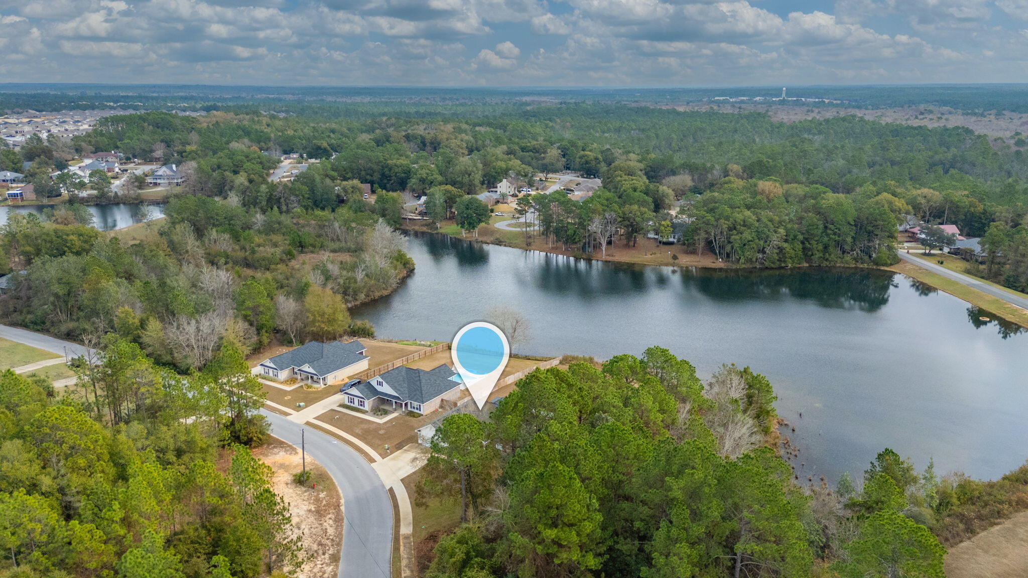 280 Timberline Drive Crestview, FL 32539 - Photo 43 of 46 an aerial view of a house with a lake view