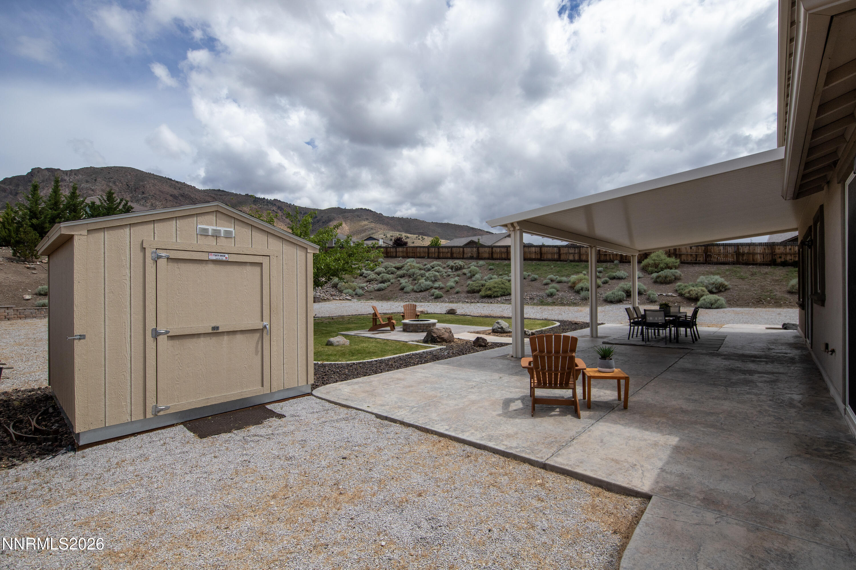 10150 Barrel Racer Drive Reno, NV 89521 - Photo 51 of 64 a view of a terrace with a garden