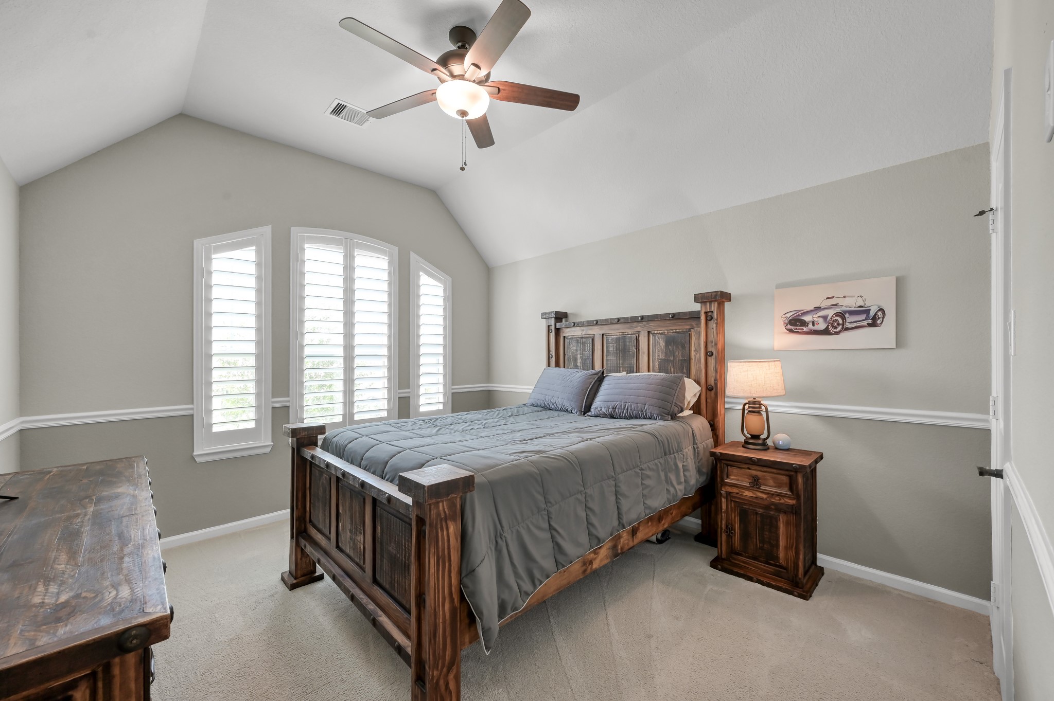 25015 Karacabey Court Spring, TX 77389 - Photo 39 of 49 Upstairs bedroom 3- this one is across the walkway from the flex room. It does not have an ensuite but shares the hall bathroom.