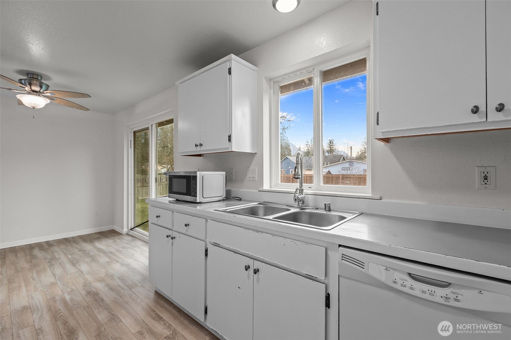 224 7th Street Gold Bar, WA 98251 - Photo 12 of 35 a kitchen with a sink cabinets and window