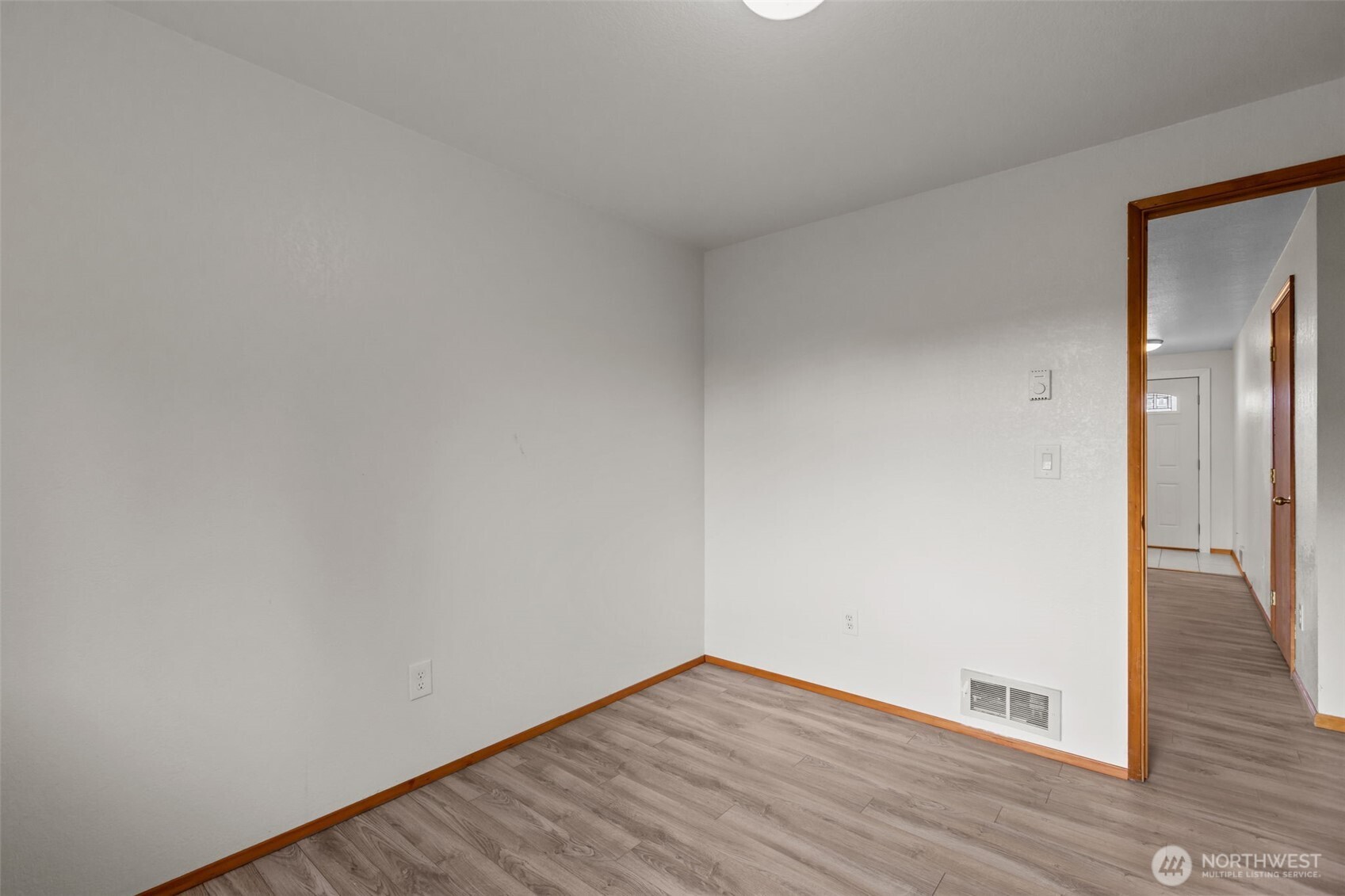 224 7th Street Gold Bar, WA 98251 - Photo 15 of 35 a view of an empty room and wooden floor