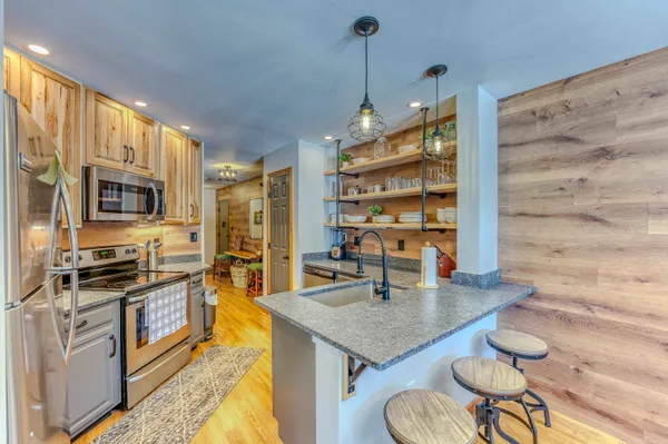 $415,000 | 20 Crossing Drive, Unit 104, North Woodstock, NH 03262