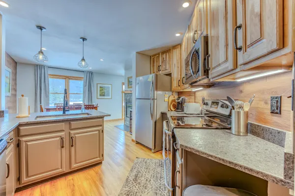 $415,000 | 20 Crossing Drive, Unit 104, North Woodstock, NH 03262
