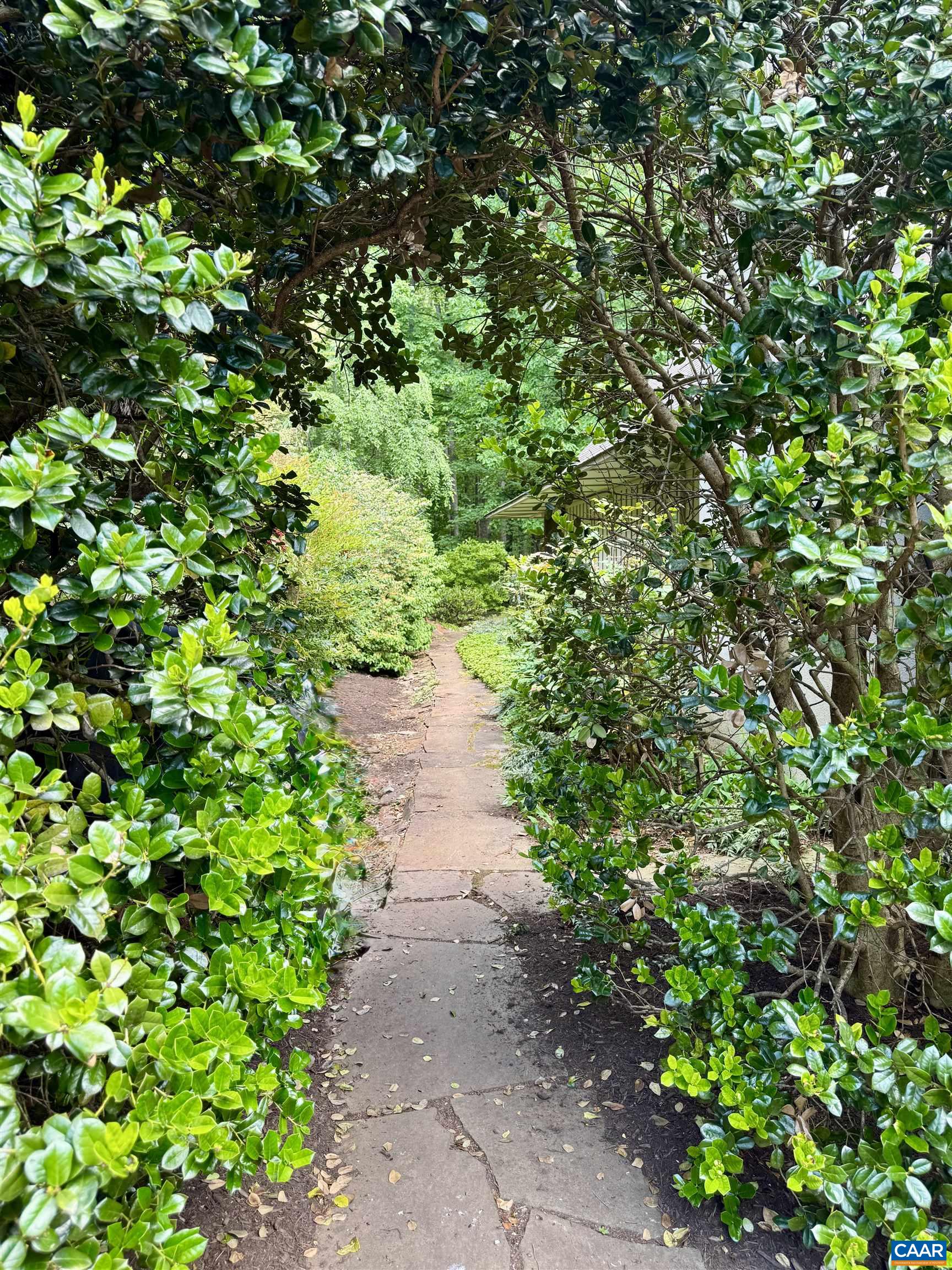 889 Old Garth Road Charlottesville, VA 22901 - Photo 14 of 35 a view of a pathway both side of white house