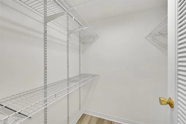 a bathroom with a sink and a window