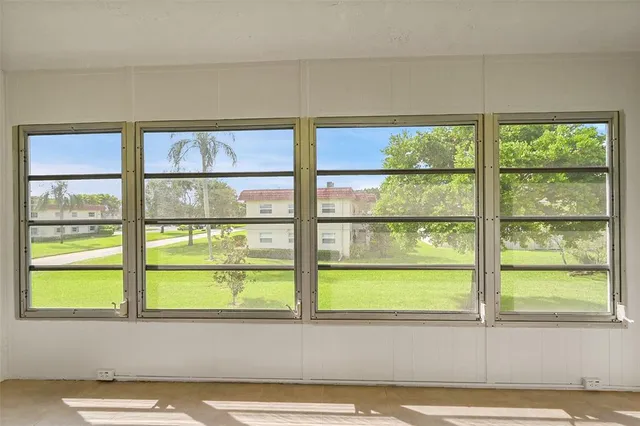 a view of a room that has a window