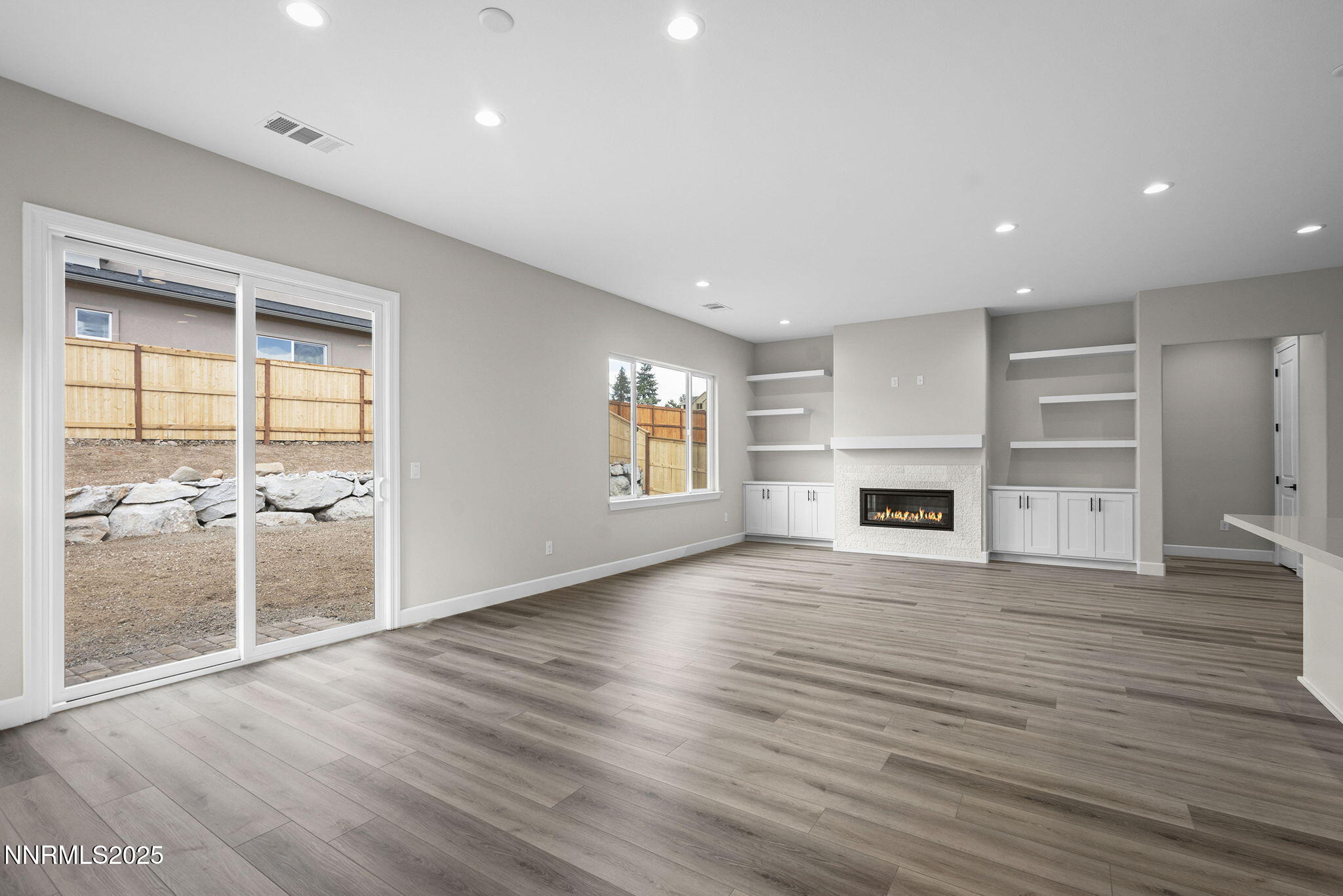 171 Commodore Drive, Unit LOT 325 Verdi, NV 89439 - Photo 12 of 28 an empty room with wooden floor and windows