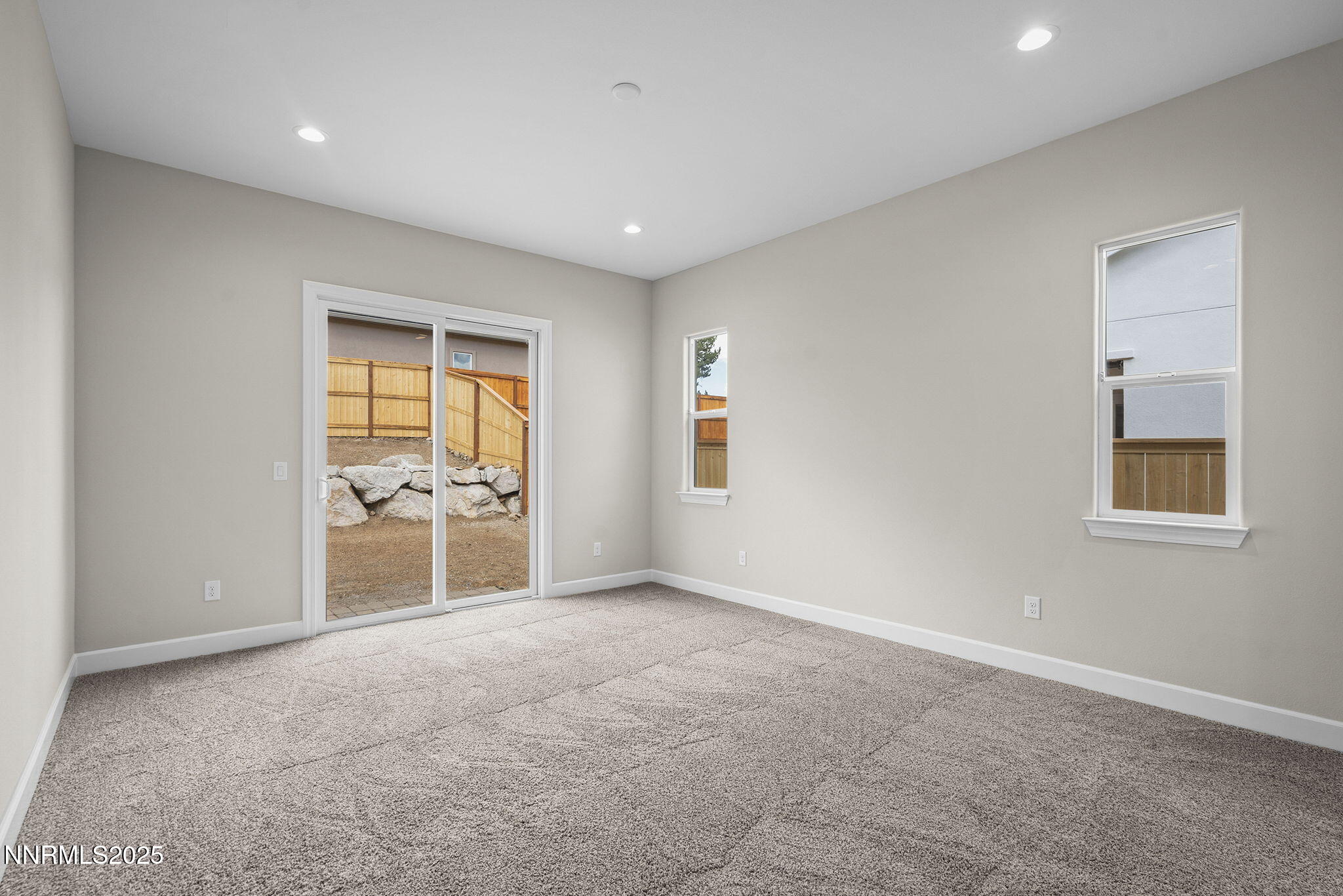 171 Commodore Drive, Unit LOT 325 Verdi, NV 89439 - Photo 17 of 28 a view of a big room with windows and chandelier fan