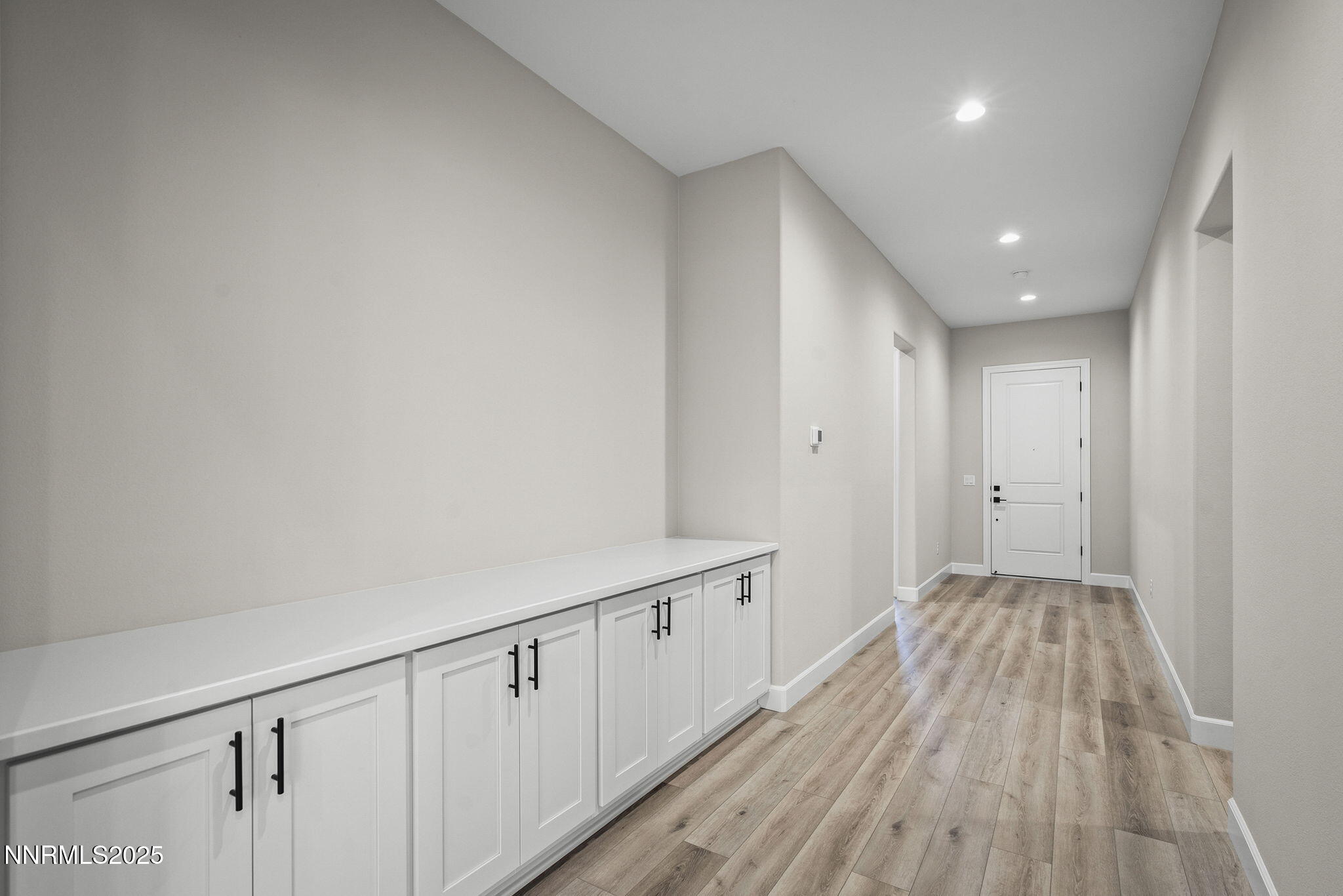 171 Commodore Drive, Unit LOT 325 Verdi, NV 89439 - Photo 20 of 28 a view of a hallway with wooden floor