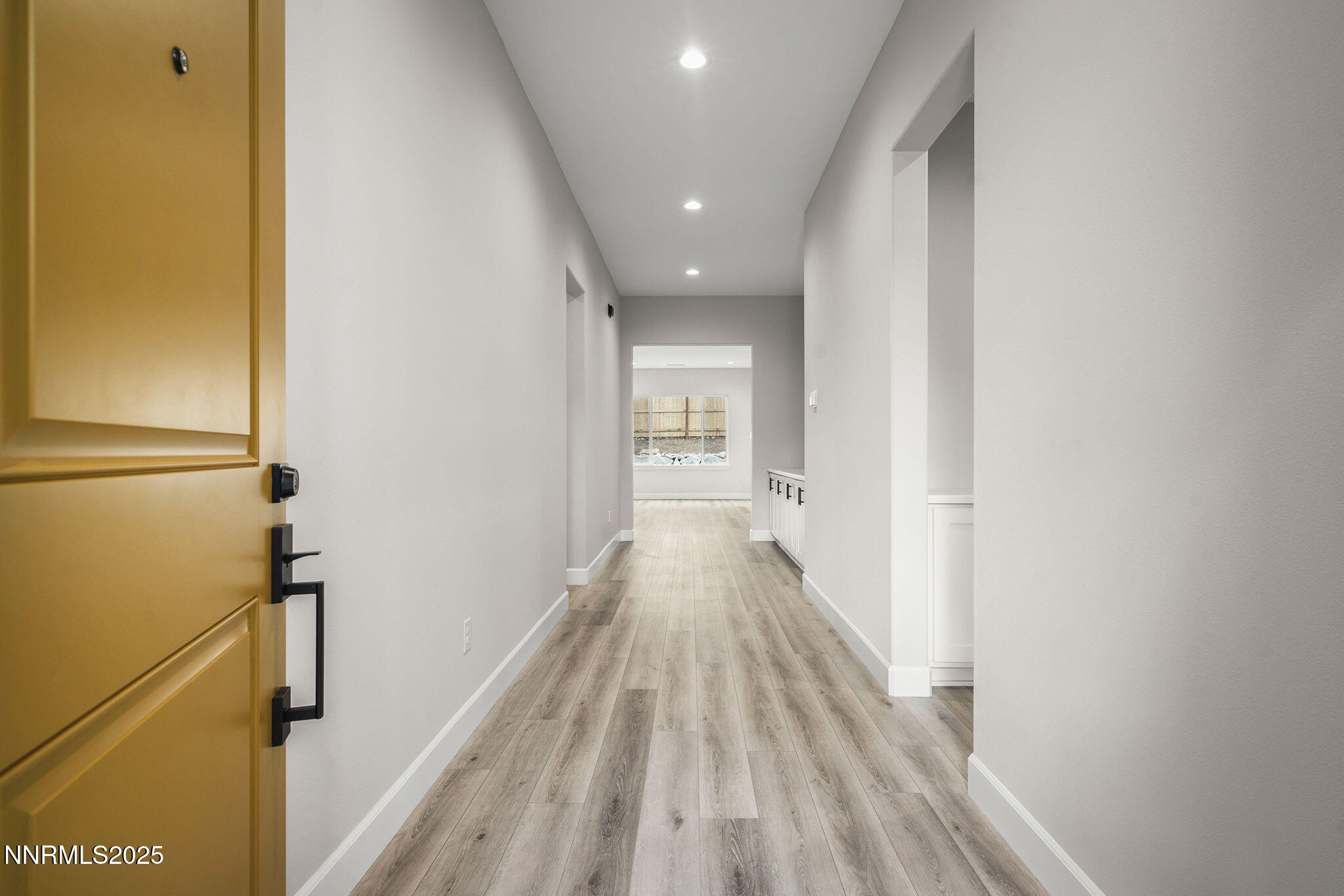 171 Commodore Drive, Unit LOT 325 Verdi, NV 89439 - Photo 2 of 28 a view of a hallway with wooden floor