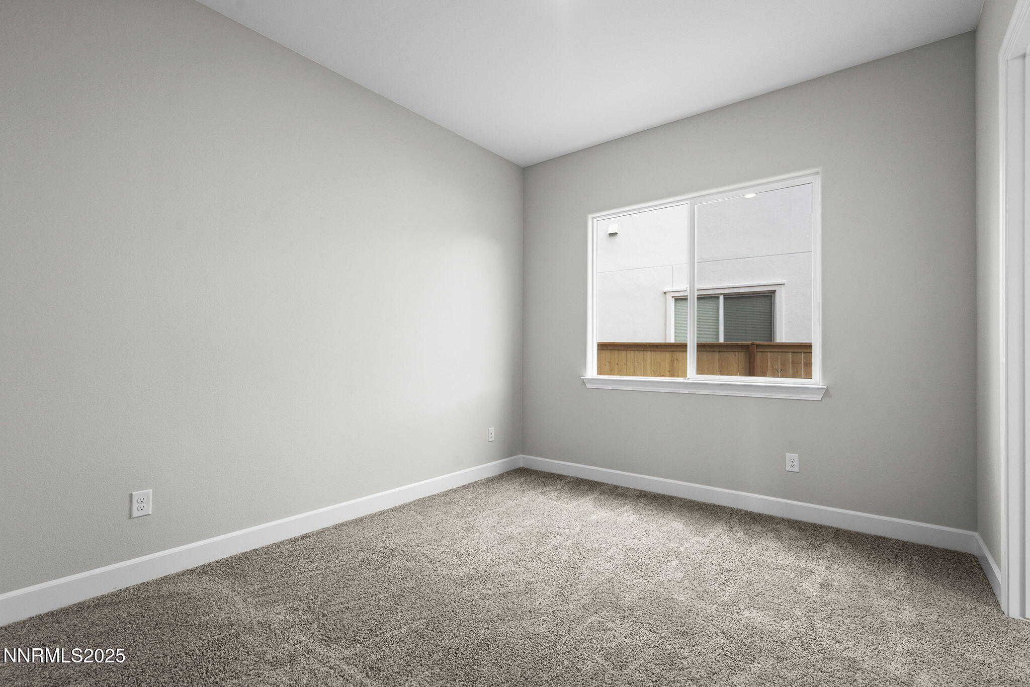 171 Commodore Drive, Unit LOT 325 Verdi, NV 89439 - Photo 23 of 28 a view of an empty room with a window