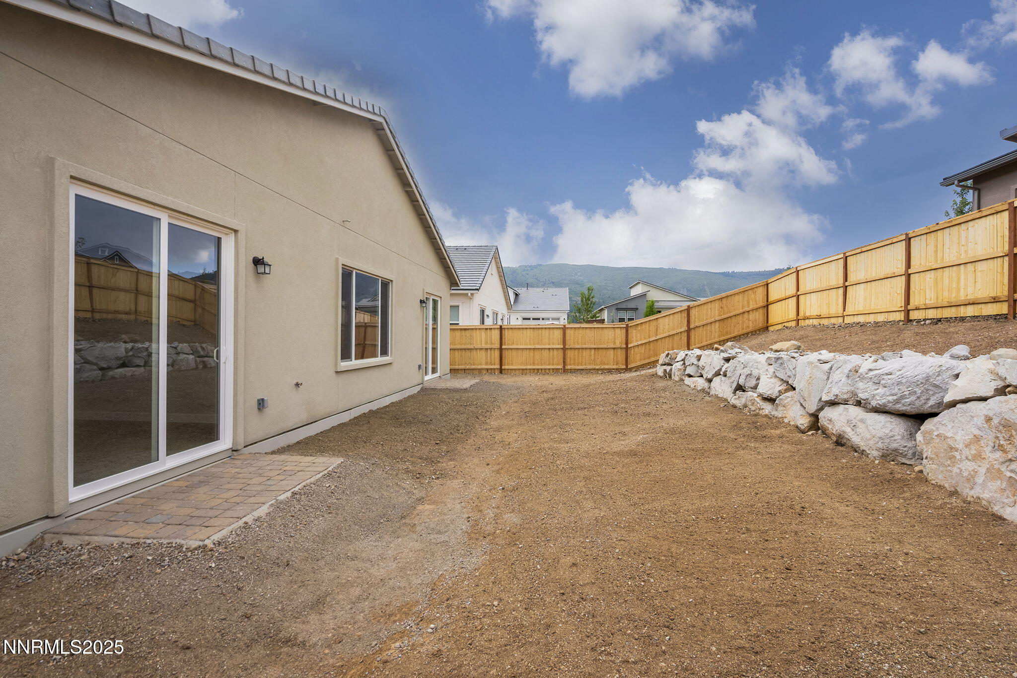 171 Commodore Drive, Unit LOT 325 Verdi, NV 89439 - Photo 27 of 28 a view of a backyard of building