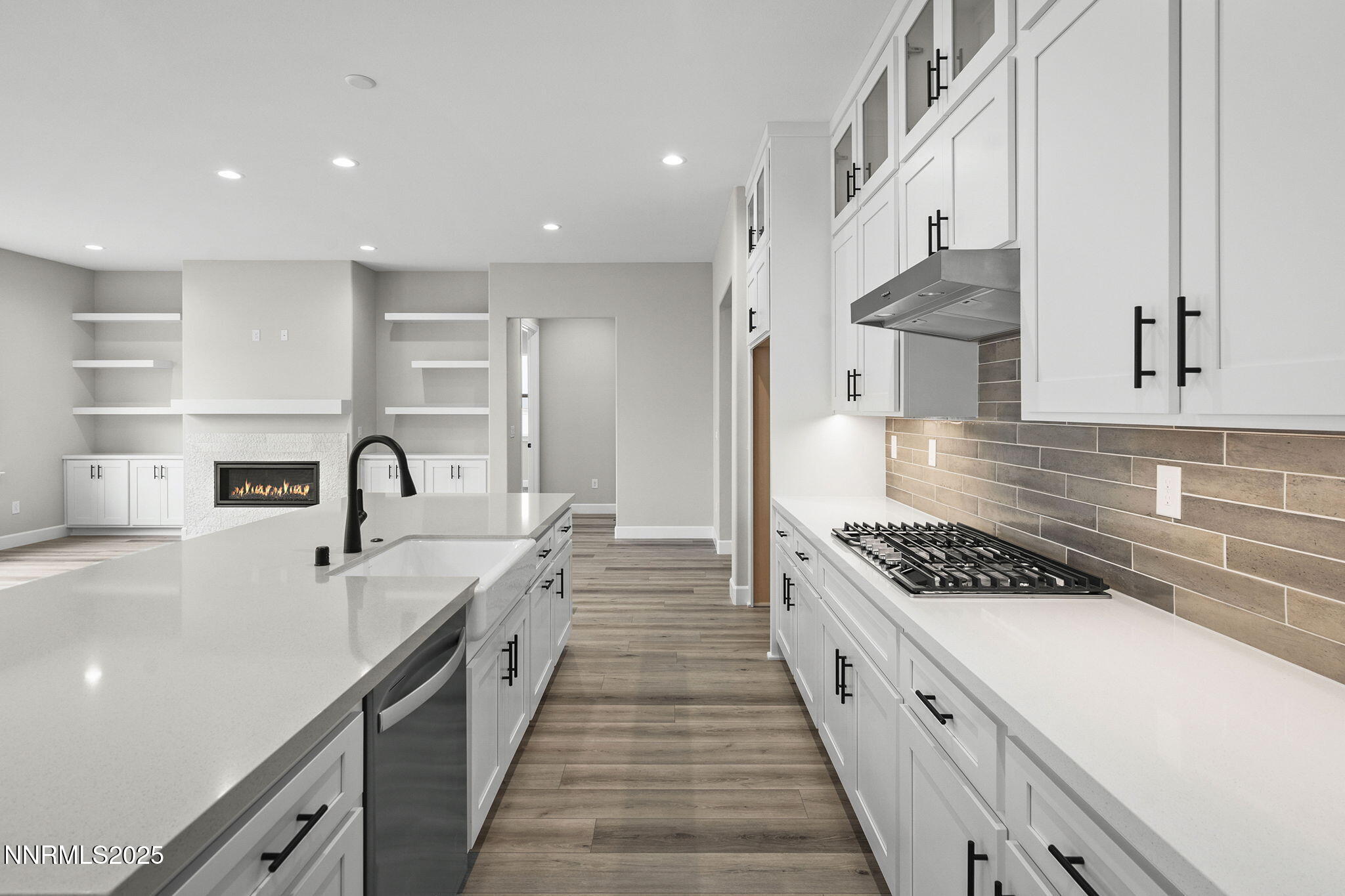 171 Commodore Drive, Unit LOT 325 Verdi, NV 89439 - Photo 8 of 28 a large white kitchen with stainless steel appliances granite countertop a stove and a sink