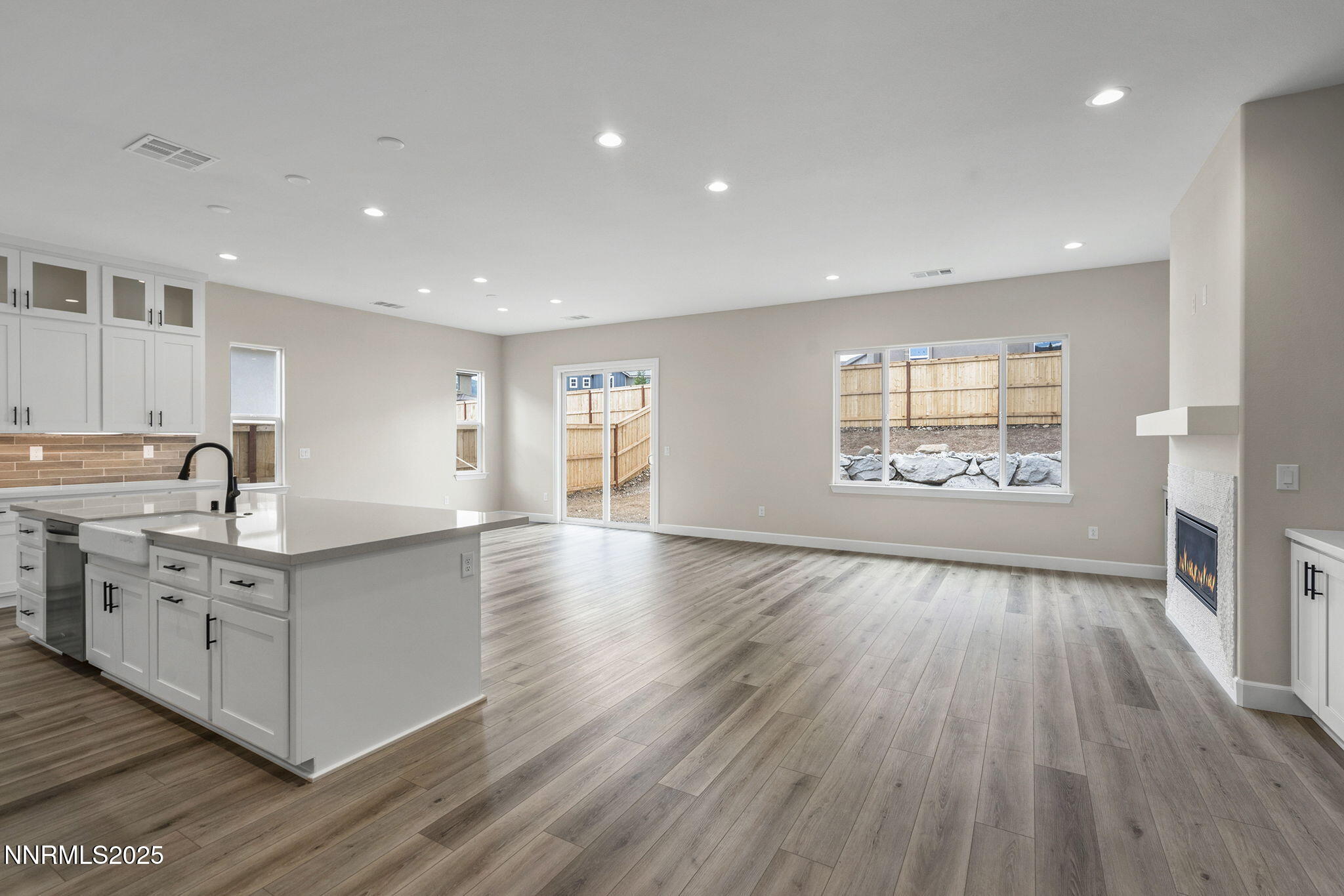 171 Commodore Drive, Unit LOT 325 Verdi, NV 89439 - Photo 10 of 28 a large kitchen with stainless steel appliances granite countertop a lot of counter space and wooden floors