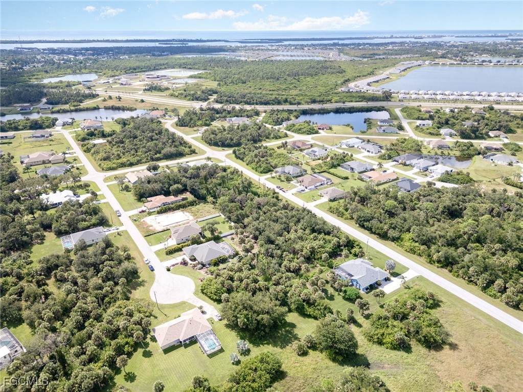 254 Spring Drive Rotonda West, FL 33947 - Photo 11 of 13 a view of city and ocean