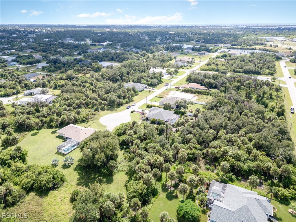 254 Spring Drive Rotonda West, FL 33947 - Photo 7 of 13 a view of a city