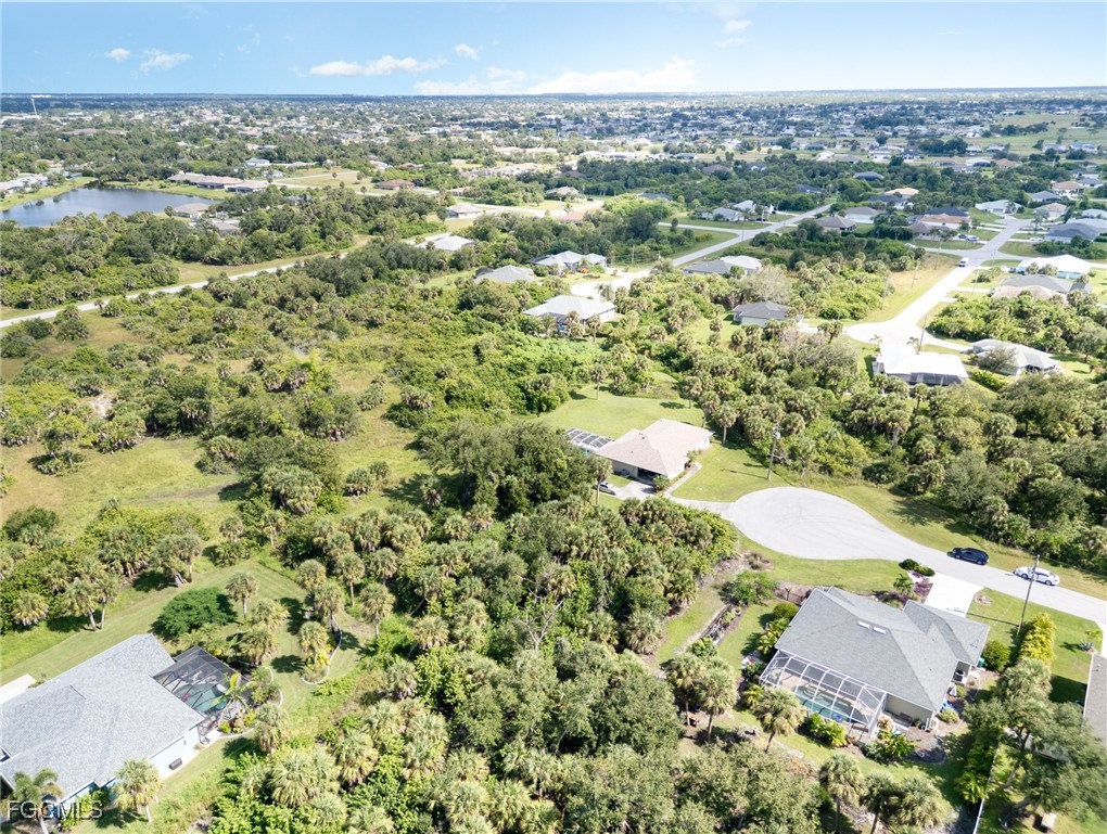 254 Spring Drive Rotonda West, FL 33947 - Photo 8 of 13 a view of a city