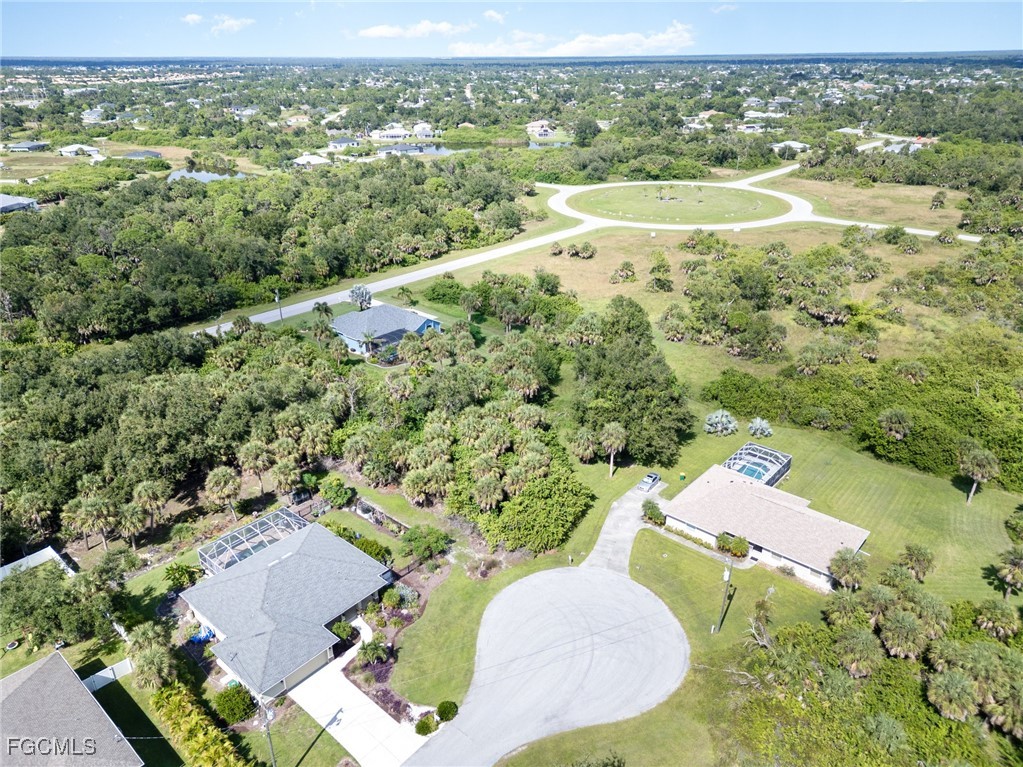 254 Spring Drive Rotonda West, FL 33947 - Photo 10 of 13 an aerial view of residential houses with outdoor space