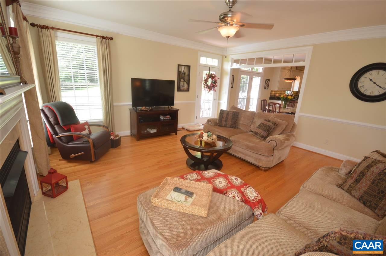 401 Sam Durrer Road Ruckersville, VA 22968 - Photo 11 of 50 a living room with furniture a flat screen tv and a window