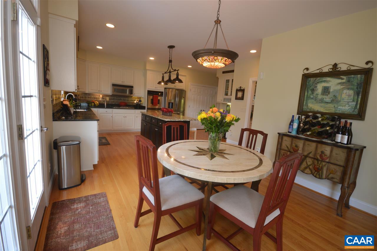 401 Sam Durrer Road Ruckersville, VA 22968 - Photo 12 of 50 a view of a dining room with furniture and wooden floor