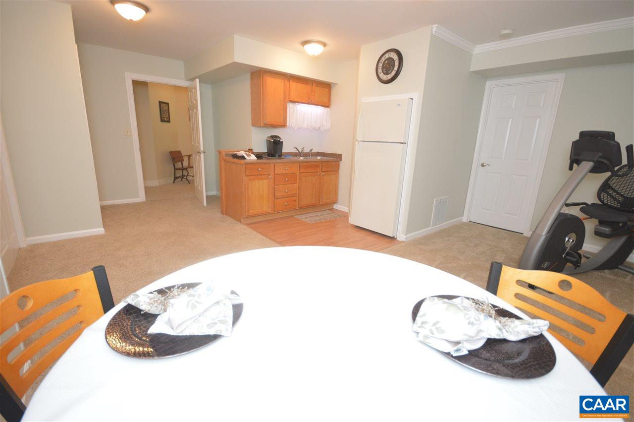 401 Sam Durrer Road Ruckersville, VA 22968 - Photo 33 of 50 a kitchen with a sink and a refrigerator