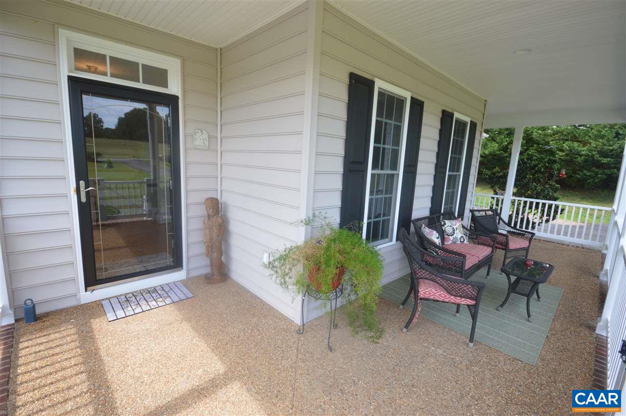 401 Sam Durrer Road Ruckersville, VA 22968 - Photo 41 of 50 a view of a porch with a bench and a yard