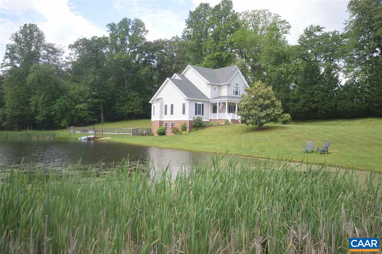 401 Sam Durrer Road Ruckersville, VA 22968 - Photo 43 of 50 a view of a house with a big yard and large trees