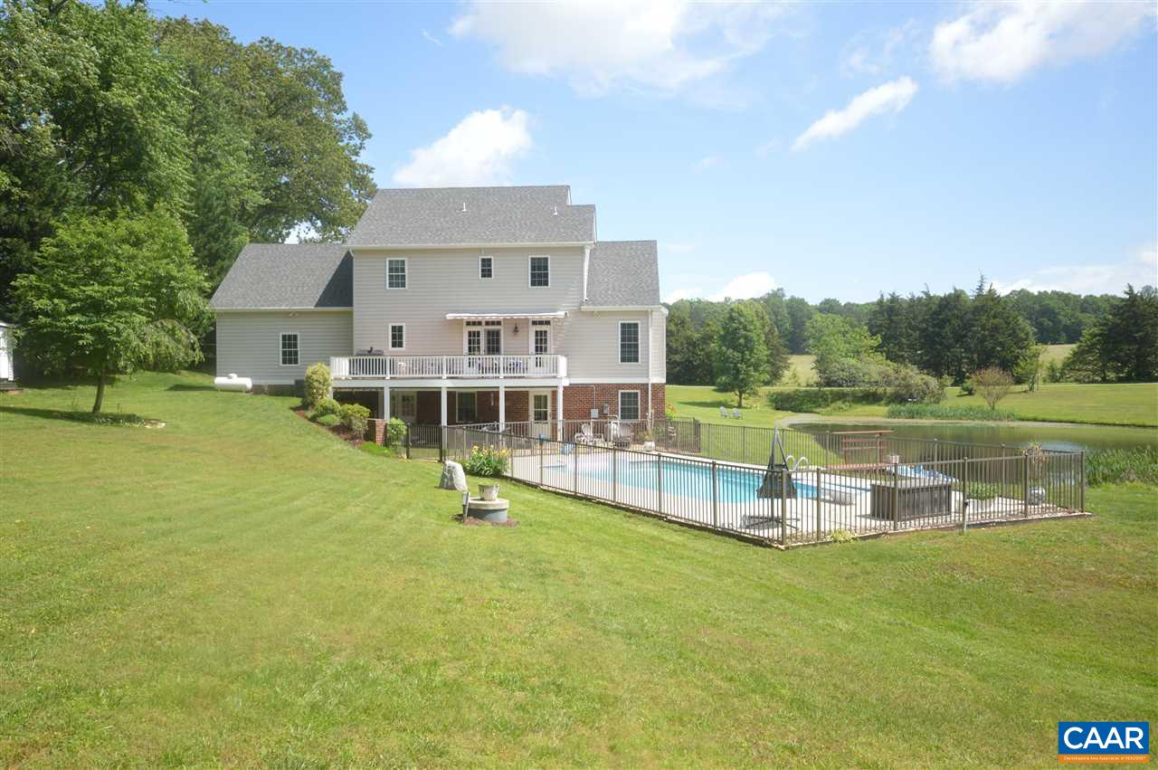 401 Sam Durrer Road Ruckersville, VA 22968 - Photo 45 of 50 an aerial view of a house with a garden and lake view