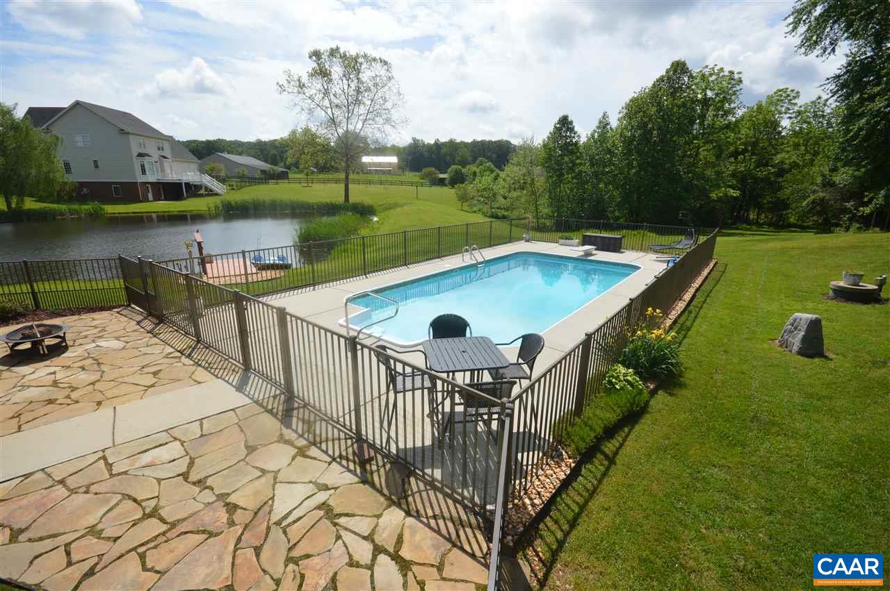 401 Sam Durrer Road Ruckersville, VA 22968 - Photo 46 of 50 swimming pool view with a lake view