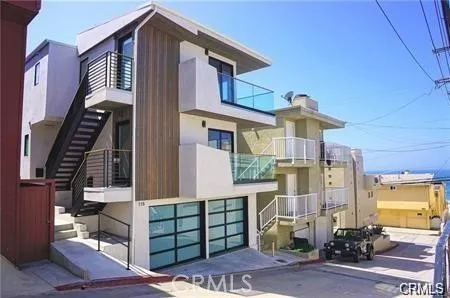a front view of a house with a garage