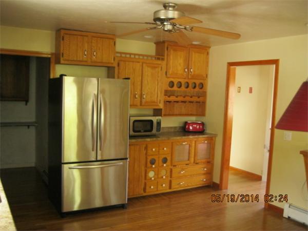 262 Czesky Road Hardwick, MA 01037 - Photo 12 of 14 a kitchen with stainless steel appliances a refrigerator and a stove top oven