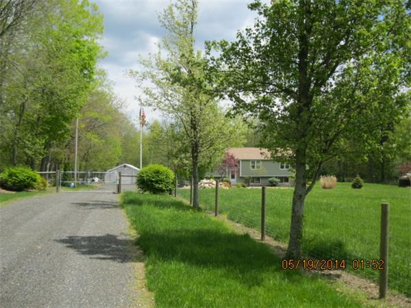 262 Czesky Road Hardwick, MA 01037 - Photo 2 of 14 a view of a park with large trees