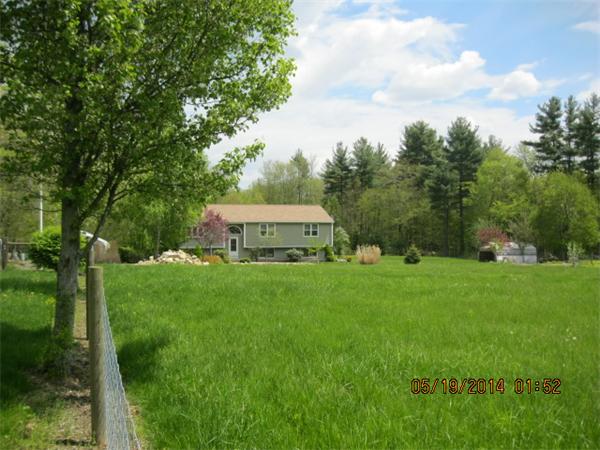 262 Czesky Road Hardwick, MA 01037 - Photo 3 of 14 a view of a house with a yard and sitting area