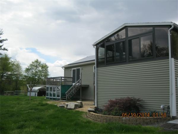 262 Czesky Road Hardwick, MA 01037 - Photo 6 of 14 a front view of a house with garden