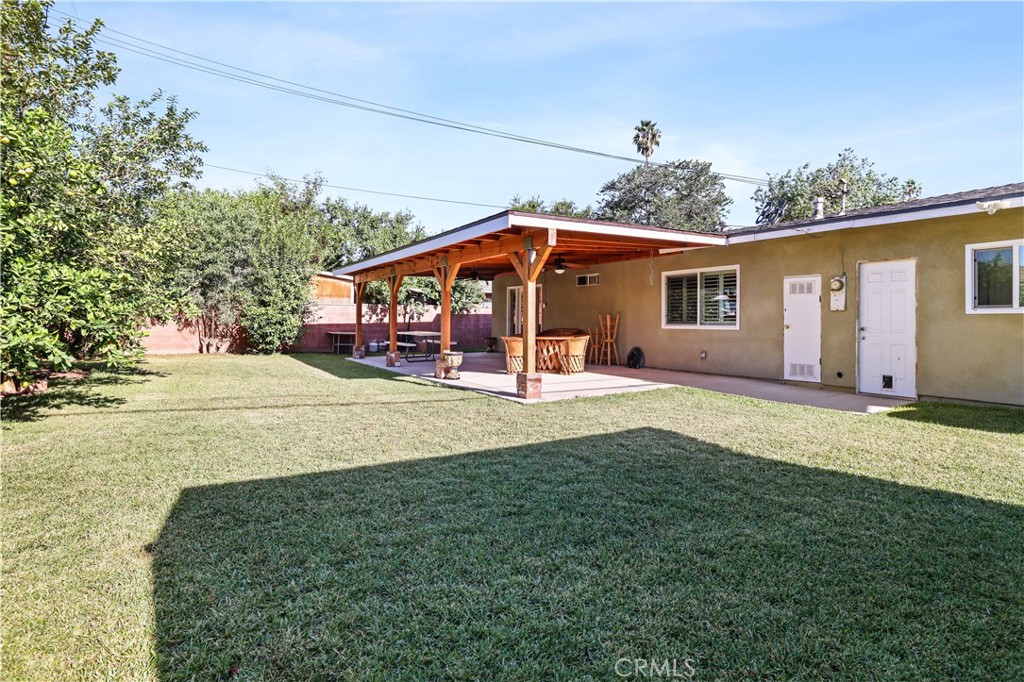 4106 Goodman Street Riverside, CA 92503 - Photo 19 of 20 a view of a house with a yard