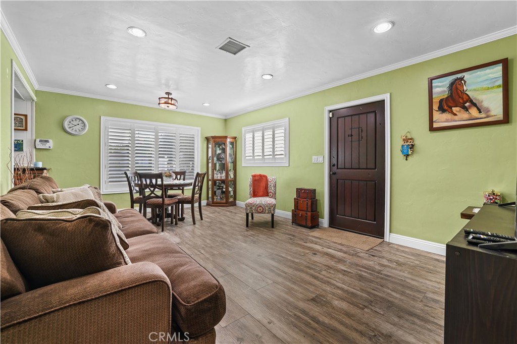 4106 Goodman Street Riverside, CA 92503 - Photo 5 of 20 a living room with furniture and a lamp