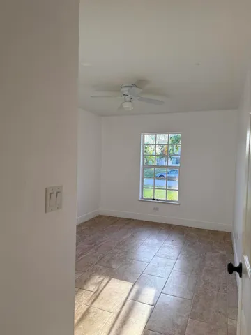 an empty room with a window