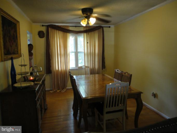 6227 Commons Road Baltimore, MD 21237 - Photo 3 of 14 Dining Room with plenty of room for entertaining!