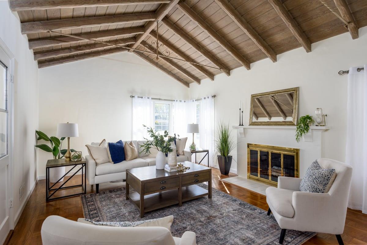 424 Bloomfield Road Burlingame, CA 94010 - Photo 4 of 14 a living room with furniture and a fireplace