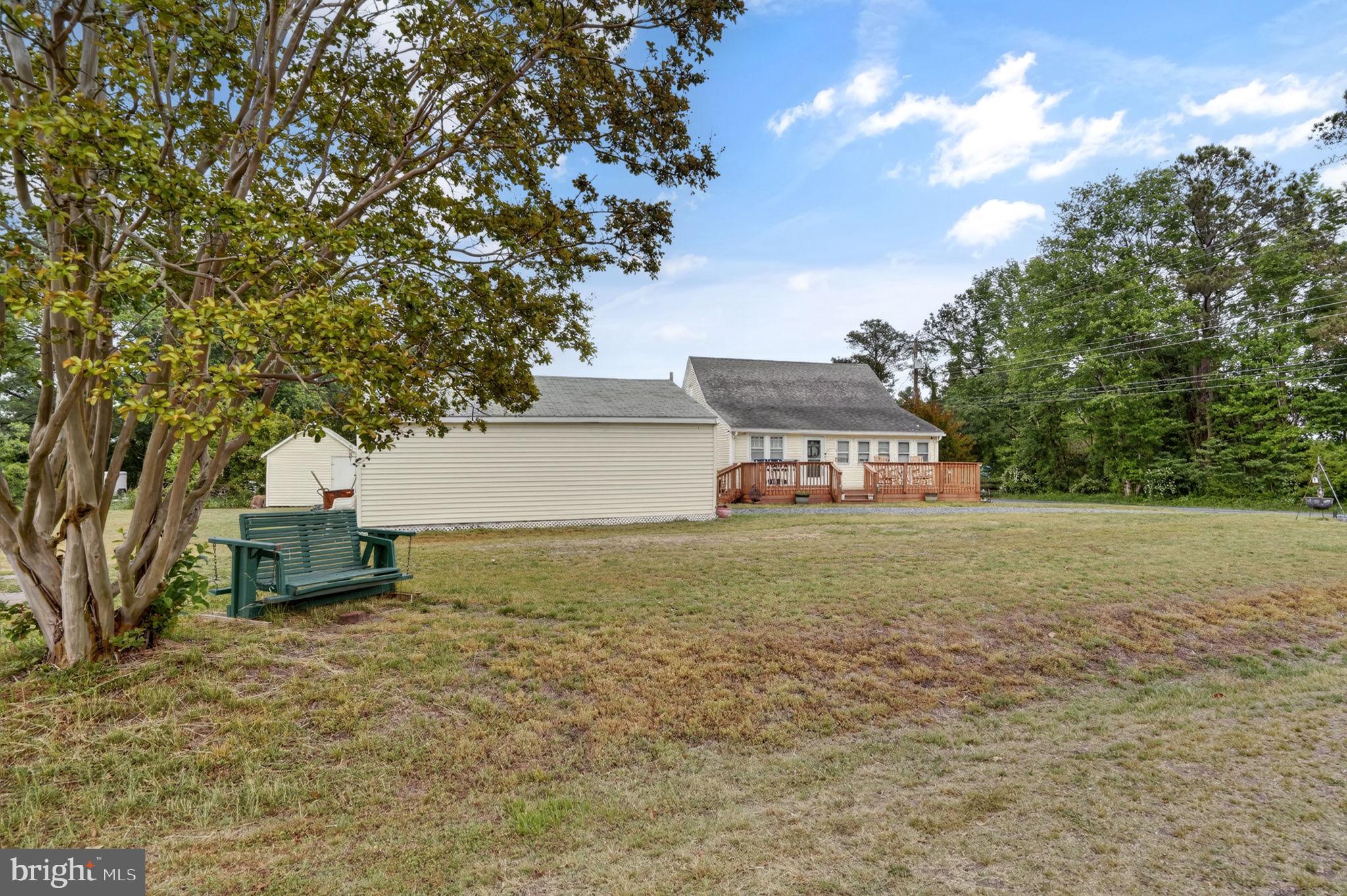 7278 Fleming Road New Church, VA 23415 - Photo 37 of 44 a view of a house with a yard