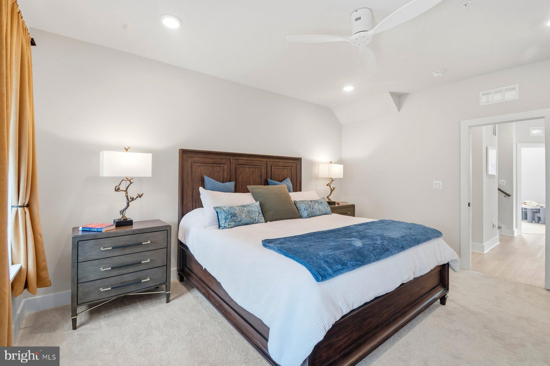 100 Glass Lane Baltimore, MD 21230 - Photo 23 of 36 a bedroom with a bed and a night stand