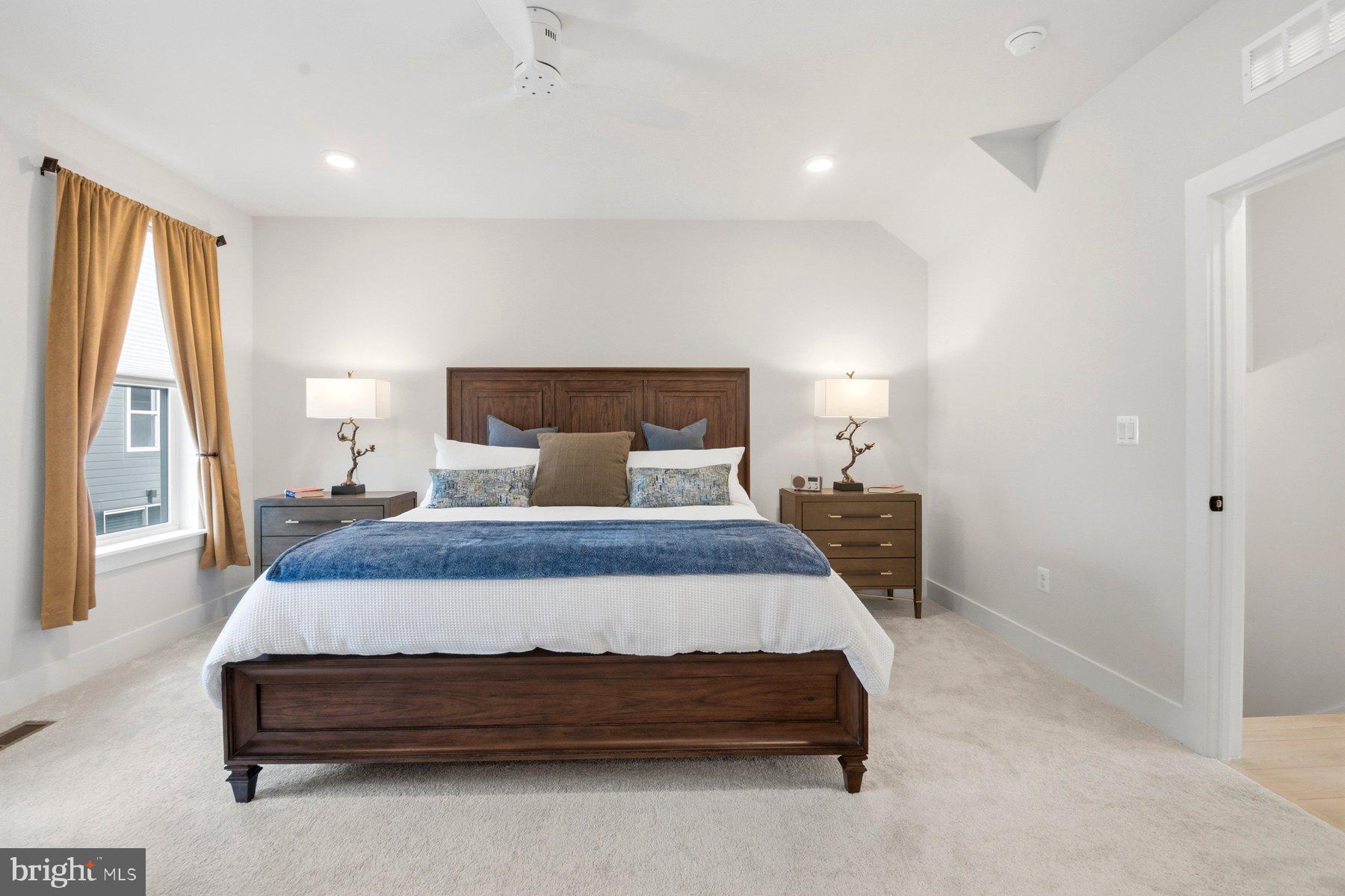100 Glass Lane Baltimore, MD 21230 - Photo 26 of 36 a bedroom with a bed and a large window